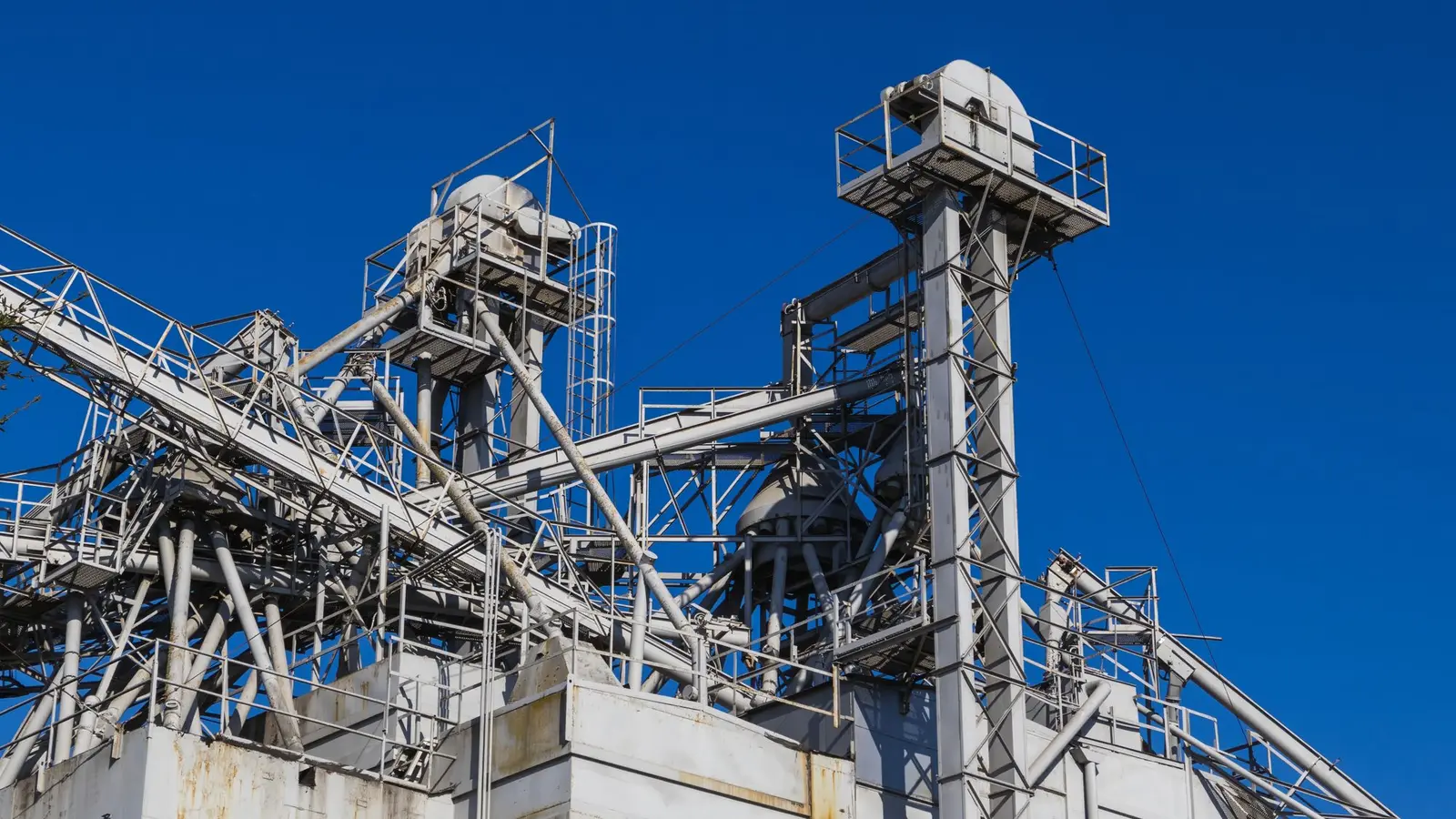 Industrial pipework and process equipment at a cement plant