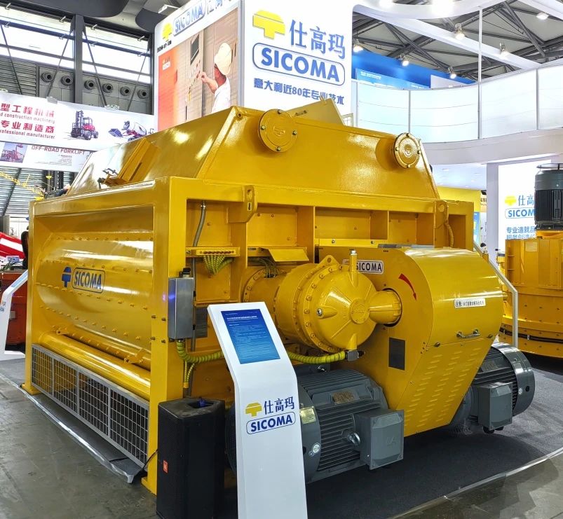 Visitors exploring equipment at the bauma CHINA 2024 stand