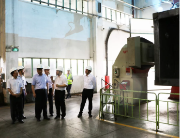 Delegation inspecting mixer assembly and quality control